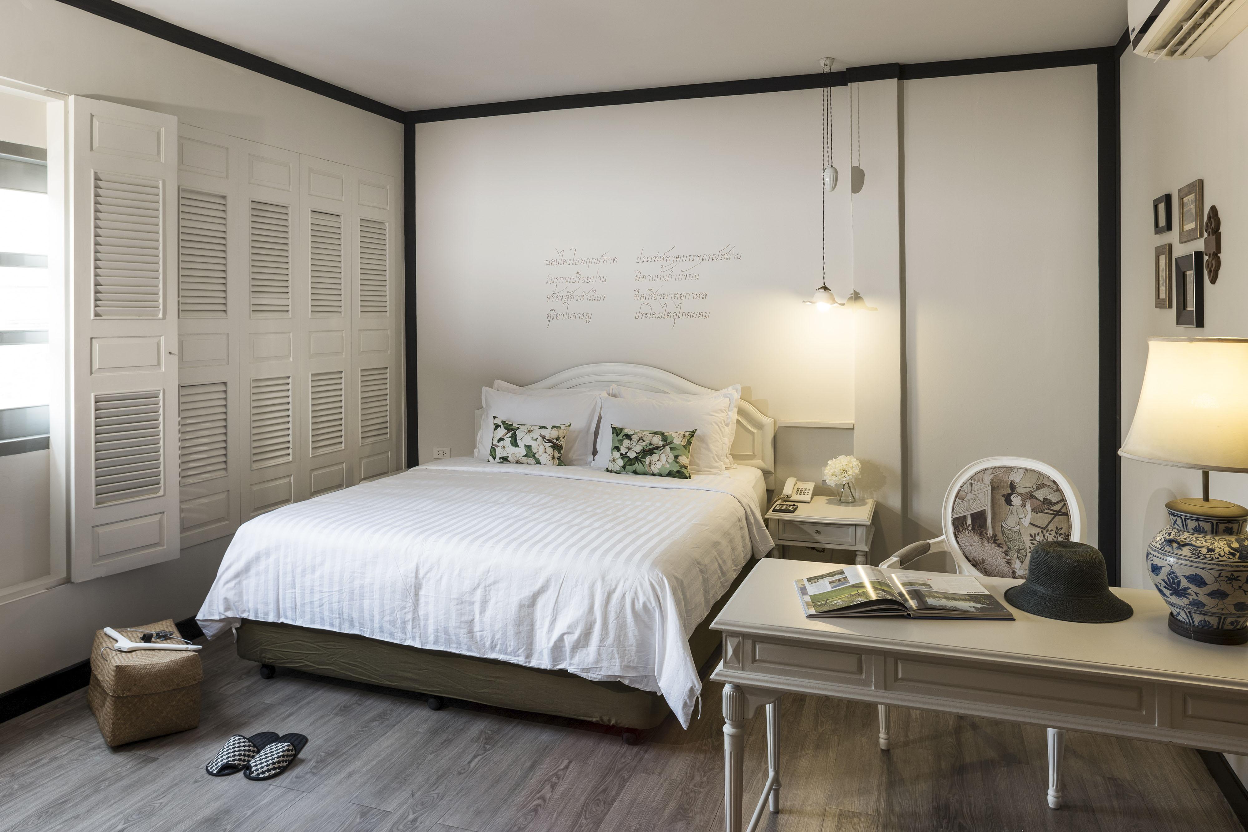 The Raweekanlaya Bangkok Exteriér fotografie A bedroom at The Library