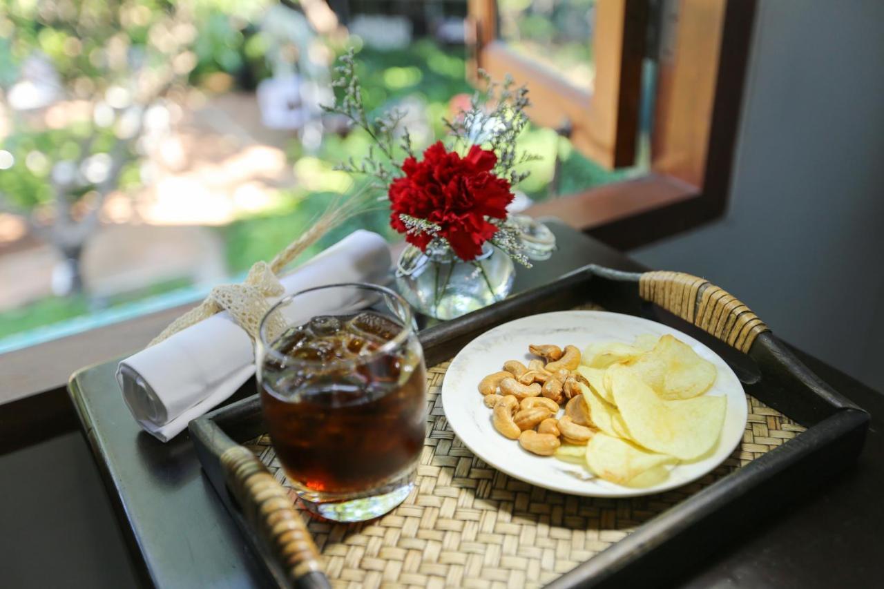 The Raweekanlaya Bangkok Exteriér fotografie A glass of Oolong tea